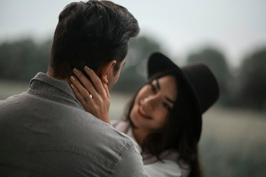a man and woman kissing