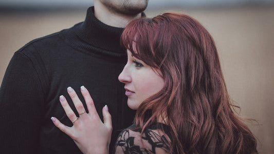 a person with the hand on the face