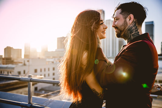 a man and woman kissing