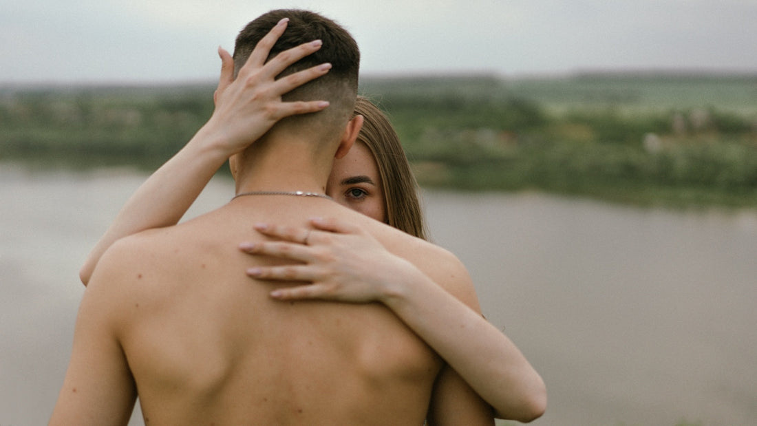 a man and a woman embracing each other