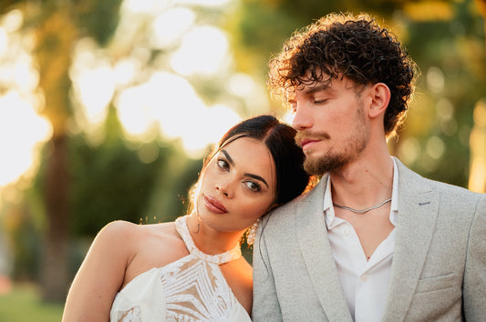 A man and a woman standing next to each other