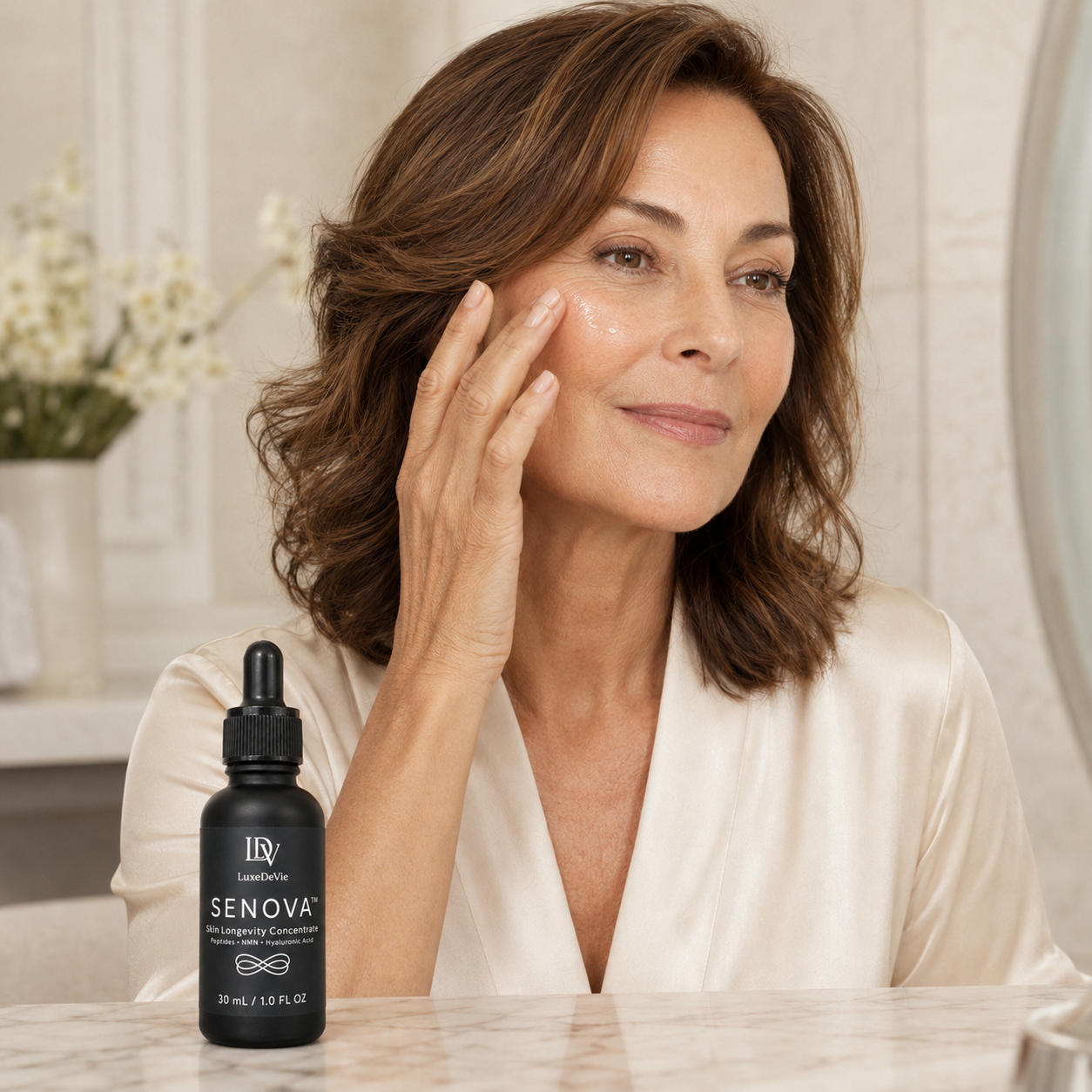 Woman applying SENOVA™ serum during her skincare ritual