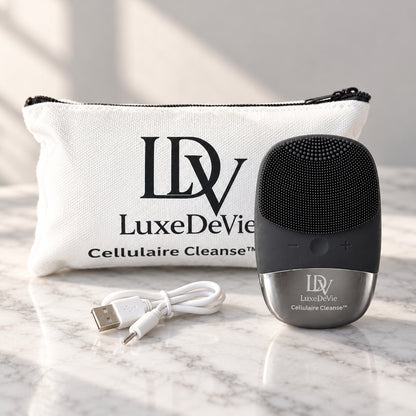 Black Cellulaire Cleanse Signature device beside its white Cellulaire Cleanse Travel Tote and USB charging cable.